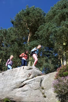 Group Of Teenage Girls Hiking In Countryside