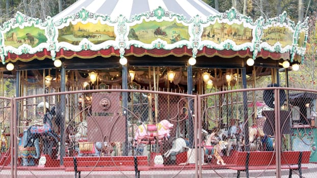 Lyon, France- November 4, 2016: Beautiful Carousel With Many Different Animals in City Park. Children on Merry-Go-Round in Lyon, France.