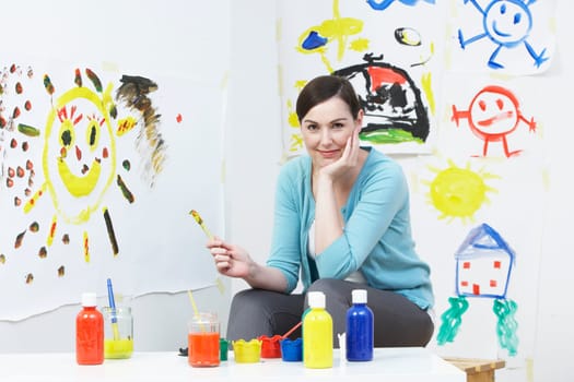 Teacher In Pre School Art Class