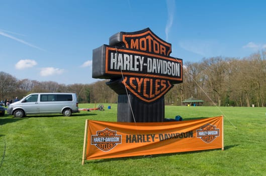 OLDENZAAL, NETHERLANDS - APRIL 10, 2016: Harley-Davidson banner and inflatable logo on the annual Hulsbeek day in the netherlands
