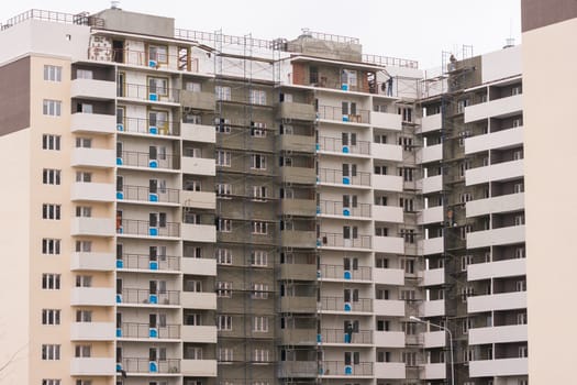 Anapa, Russia - November 16, 2016: the final stage of construction of new buildings, the execution of finishing facade works
