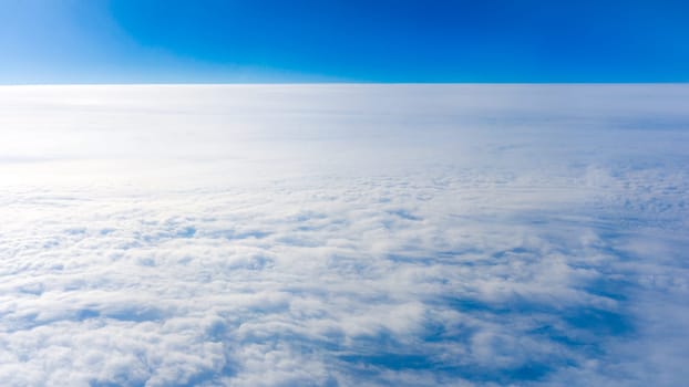 clouds from airplane window. height of 10 000 km.  Clouds