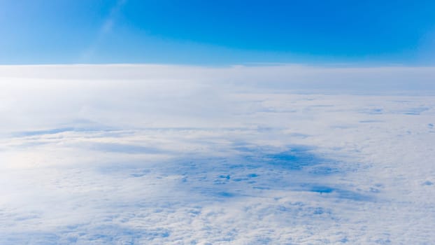 clouds from airplane window. height of 10 000 km.  Clouds