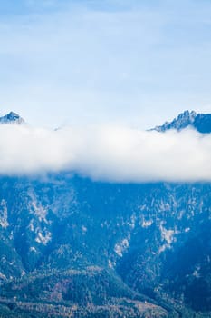 Clouds on mountain tops.  Mountain landscape with clouds. mountain landscape