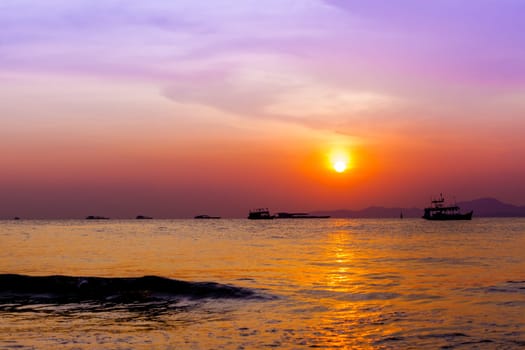 Beautiful landscape. sunset on the beach with fishing boat