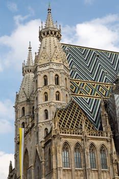 St. Stephen's Cathedral with ornately patterned, multi colored roof in Vienna, Austria