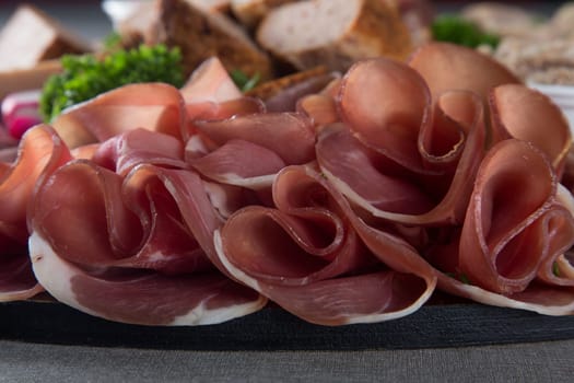 Assortment of meat delicatessen on a plate