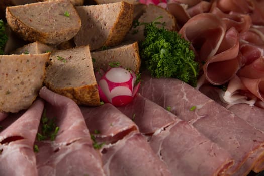 Assortment of meat delicatessen on a plate