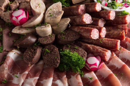 Assortment of meat delicatessen on a plate