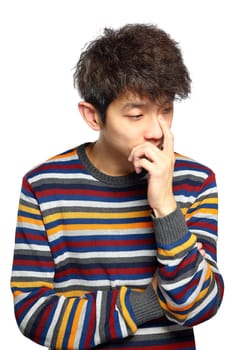 Portrait of handsome young thoughtful man isolated over white background