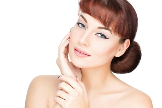 Beautiful young woman with perfect skin and red hair isolated over white background. Copy space.