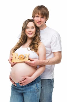 Young parents expecting their baby boy. Pregnancy. Isolated over white background