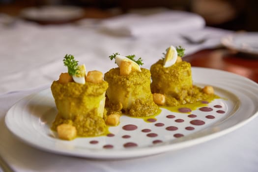 Traditional Peruvian Meal Called Ocopa Arequipena Served in a Restaurant.