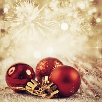 Sparkling Christmas background with baubles and decorations
