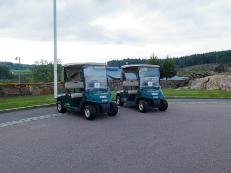 two golf car on hills golf club in sweden