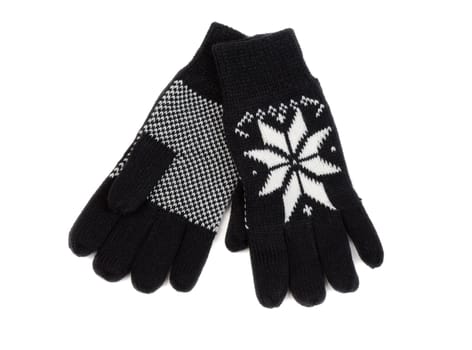 Black knit gloves with a snowflake pattern. Isolate on white.