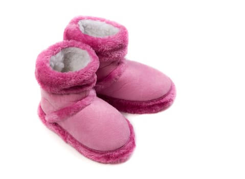 Pink warm fur boots. Isolate on white background.