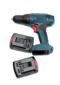 Electric screwdriver with two batteries. Isolate on white.