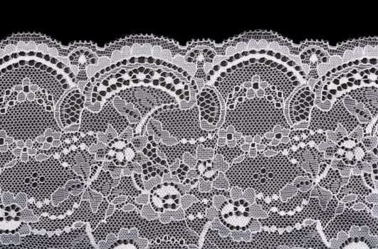 Vintage lace with flowers on black background