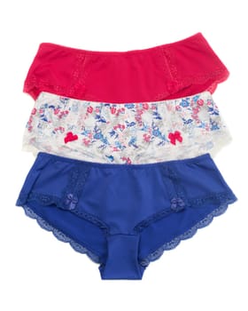 Three colored ladies' panties. Isolate on white.