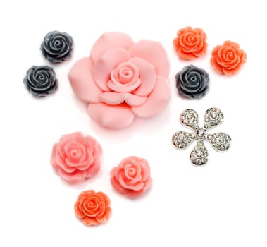 Plastic decorative roses isolated on white background