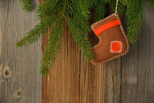 Christmas wooden background with tree and boots banner