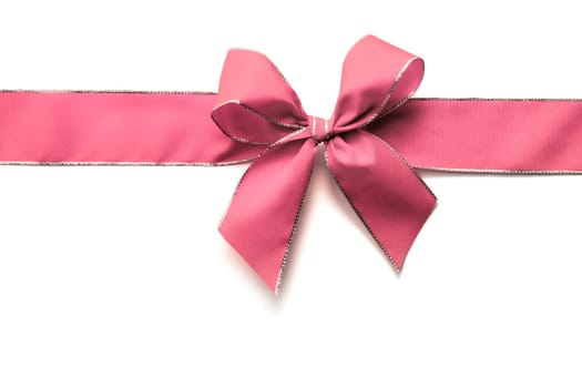 Pink ribbon and bow isolated