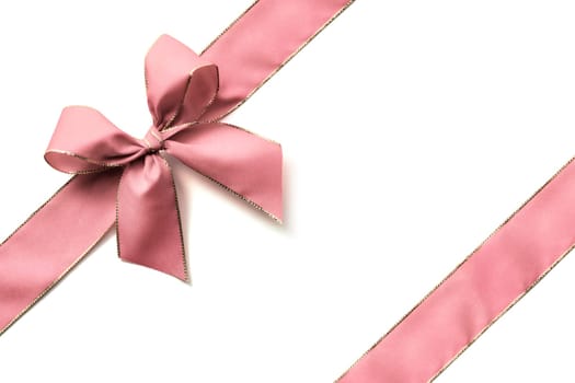 Pink ribbon and bow isolated