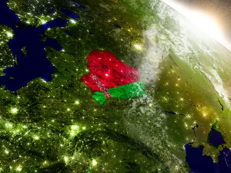 Belarus with embedded flag on planet surface during sunrise. 3D illustration with highly detailed realistic planet surface and visible city lights. Elements of this image furnished by NASA.