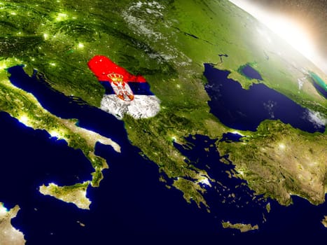 Serbia with embedded flag on planet surface during sunrise. 3D illustration with highly detailed realistic planet surface and visible city lights. Elements of this image furnished by NASA.