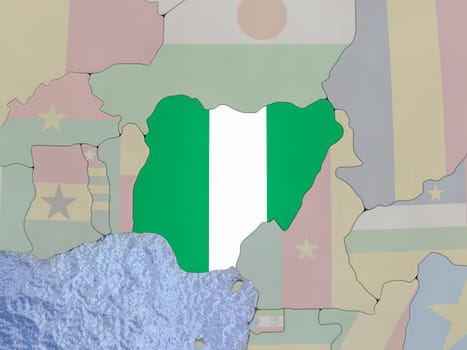 Map of Nigeria with national flag on political globe with realistic water. 3D illustration