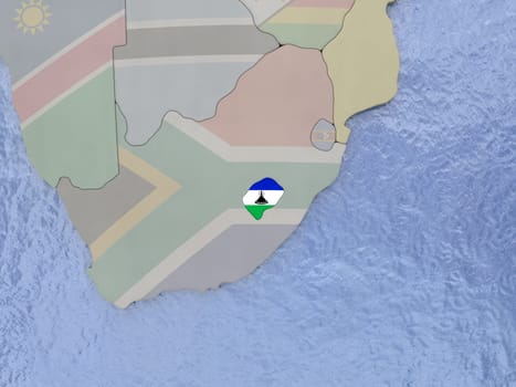 Map of Lesotho with national flag on political globe with realistic water. 3D illustration