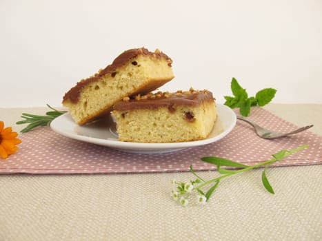 Mineral water cake with chocolate casting