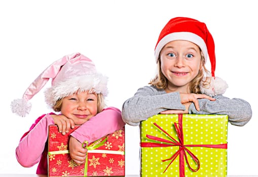 two nice girls with Santa- cap and present