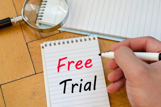 Free trial text concept write on notebook