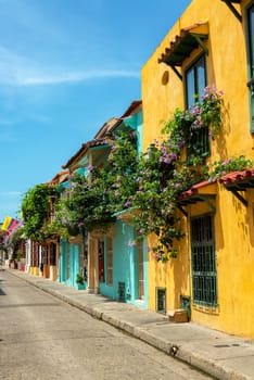Beautiful colonial buildings covered in bougainvillea flowers in Cartagena, Colombia