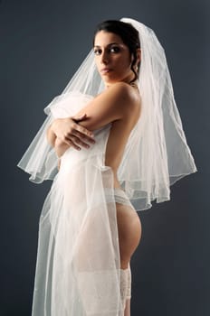 Beautiful bride posing in lingerie