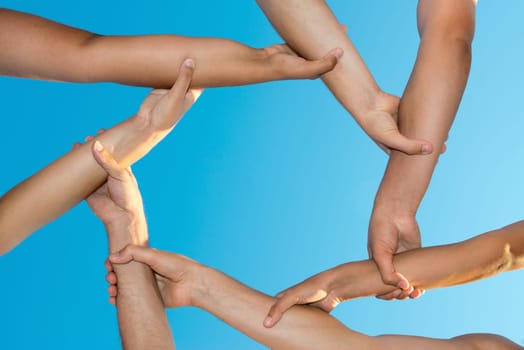 Hands forming an unbreakable chain