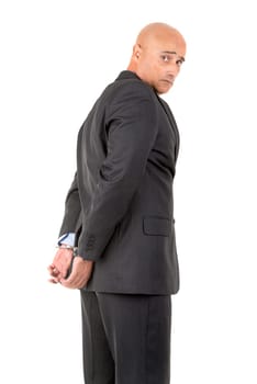 Businessman in handcuffs isolated in white background