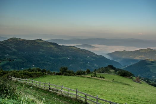 Shoot of clouds between mountains in national park Tara in Serbia in early morning
