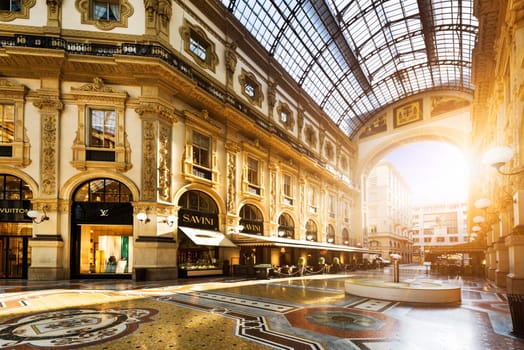 MILAN, ITALY - AUGUST 29, 2015: Luxury Store in Galleria Vittorio Emanuele II shopping mall in Milan, with tasted Italian restaurants