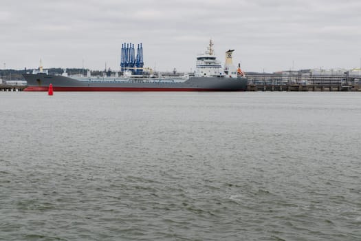 one big ship in Gothenburg harbour loiding the ship with oil