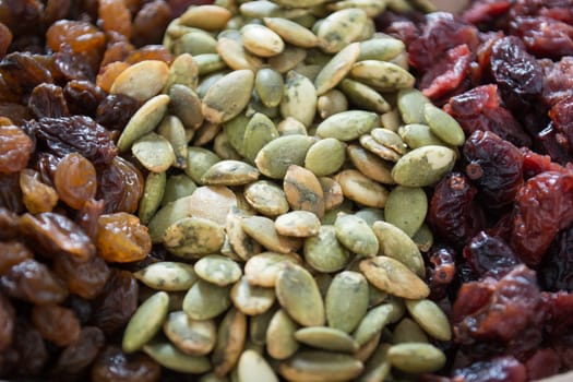 Dry fruit with pumpkin seed in the wooden bowl