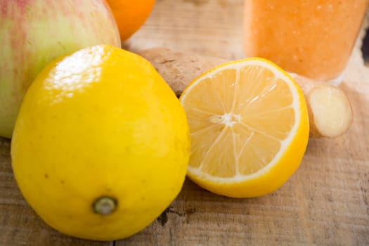 Juicy fruits and ginger on a table