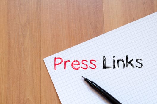 Press links text concept write on notebook