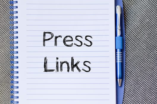 Press links text concept write on notebook