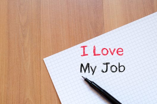 I love my job text concept write on notebook