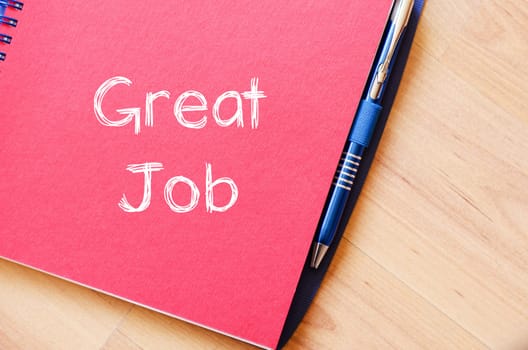 Great job text concept write on notebook