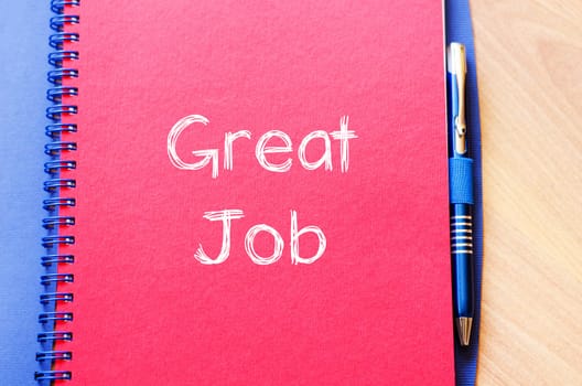 Great job text concept write on notebook