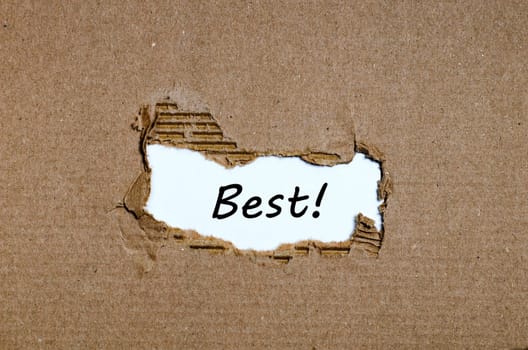 The word best appearing behind torn paper